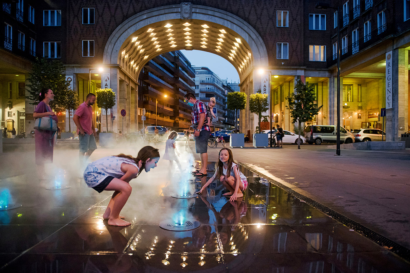 Children splashing around in Madách Square #251