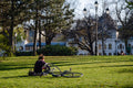 Cyclist reading in the City Park #1274
