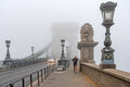 Morning run on the foggy Chain Bridge #1620