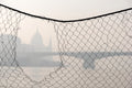 Budapest skyline through a wire fence #1875