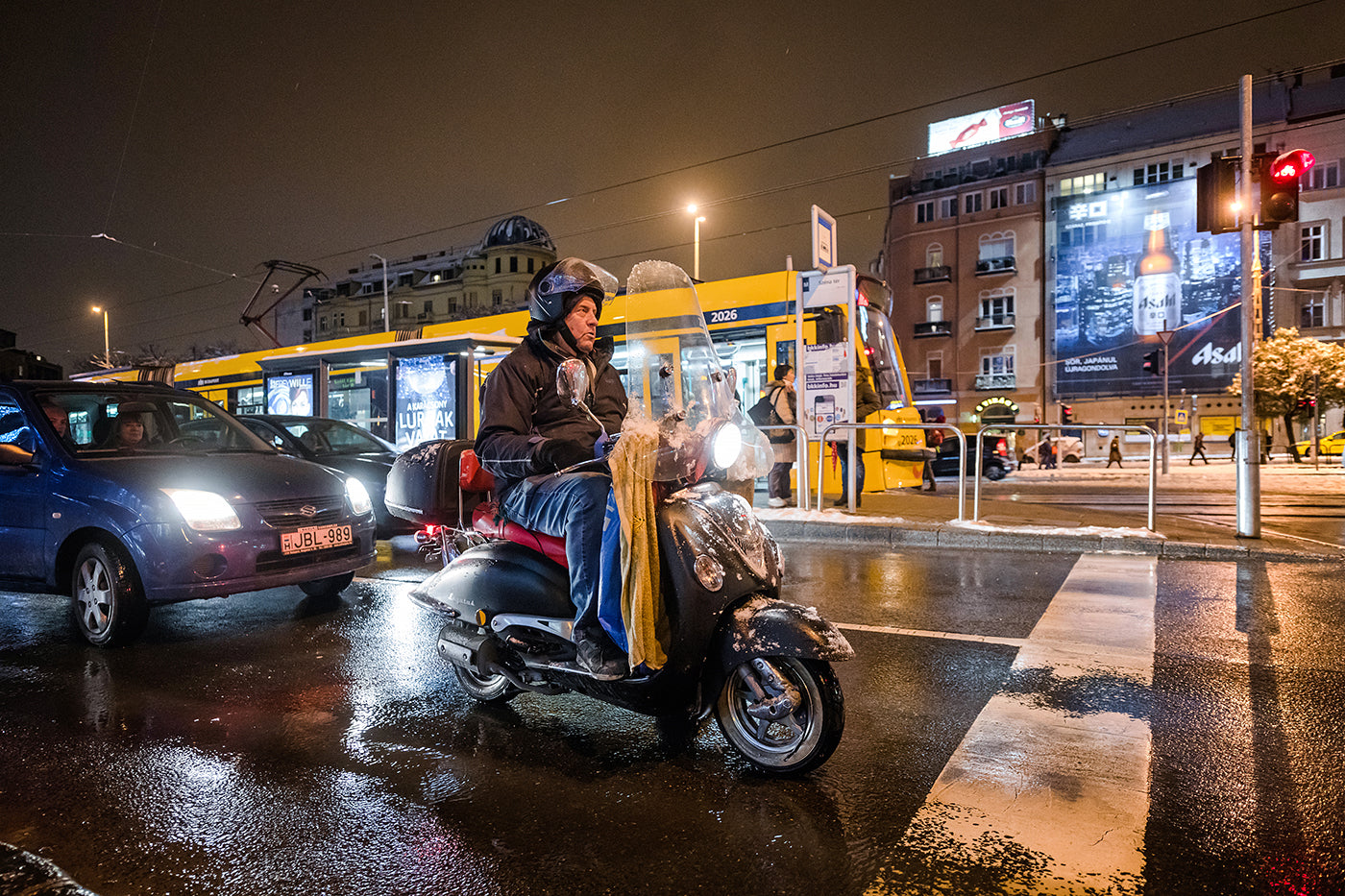 Scooter in winter on Széna Square #2243