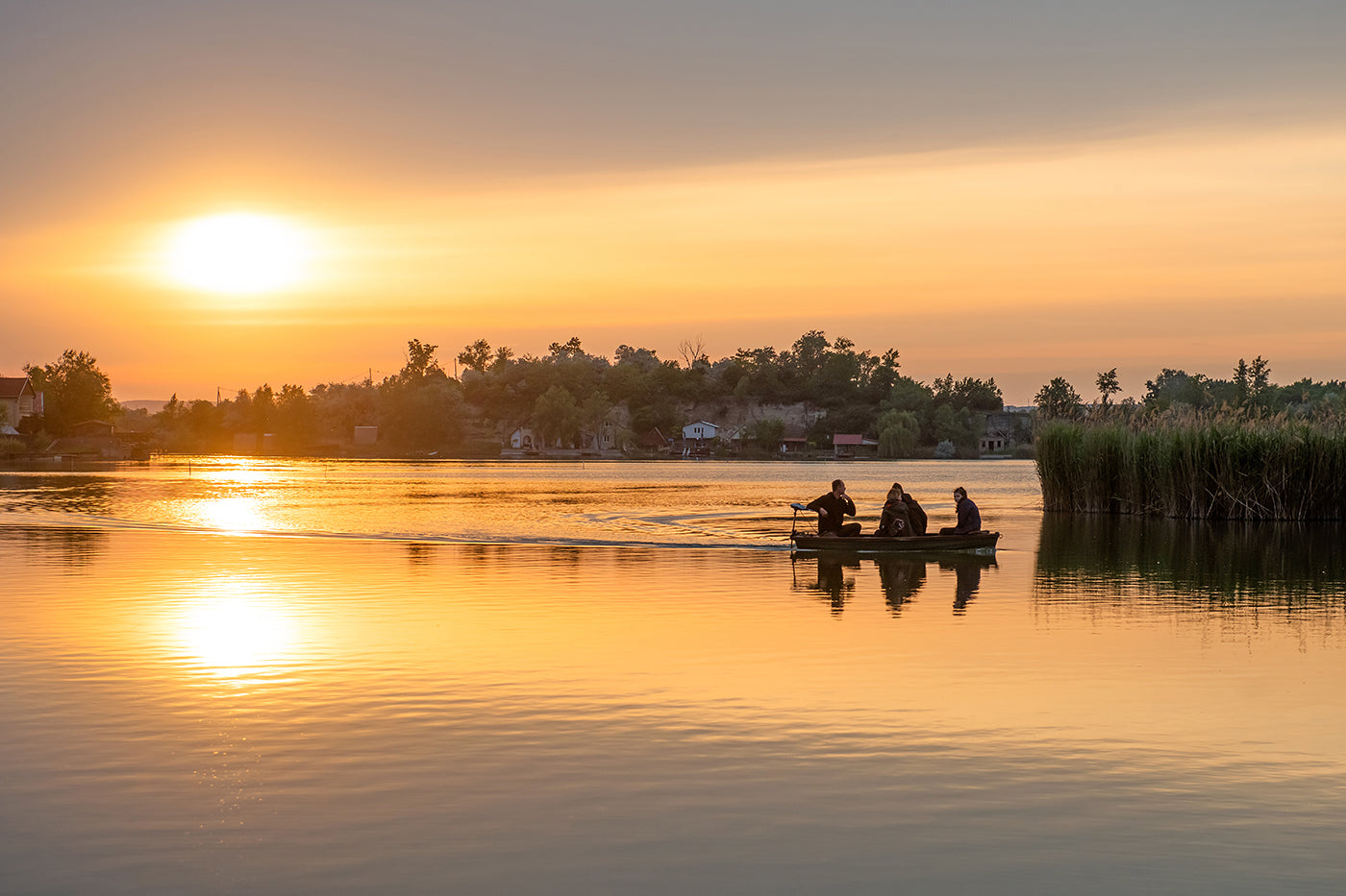 Boaters on Pebble Lake at sunset #3676