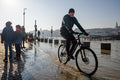 Cyclist on the quay during flood #6645