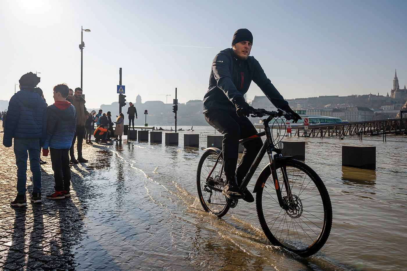 Cyclist on the quay during flood #6645