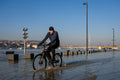 Cyclist on the quay during flood #6647