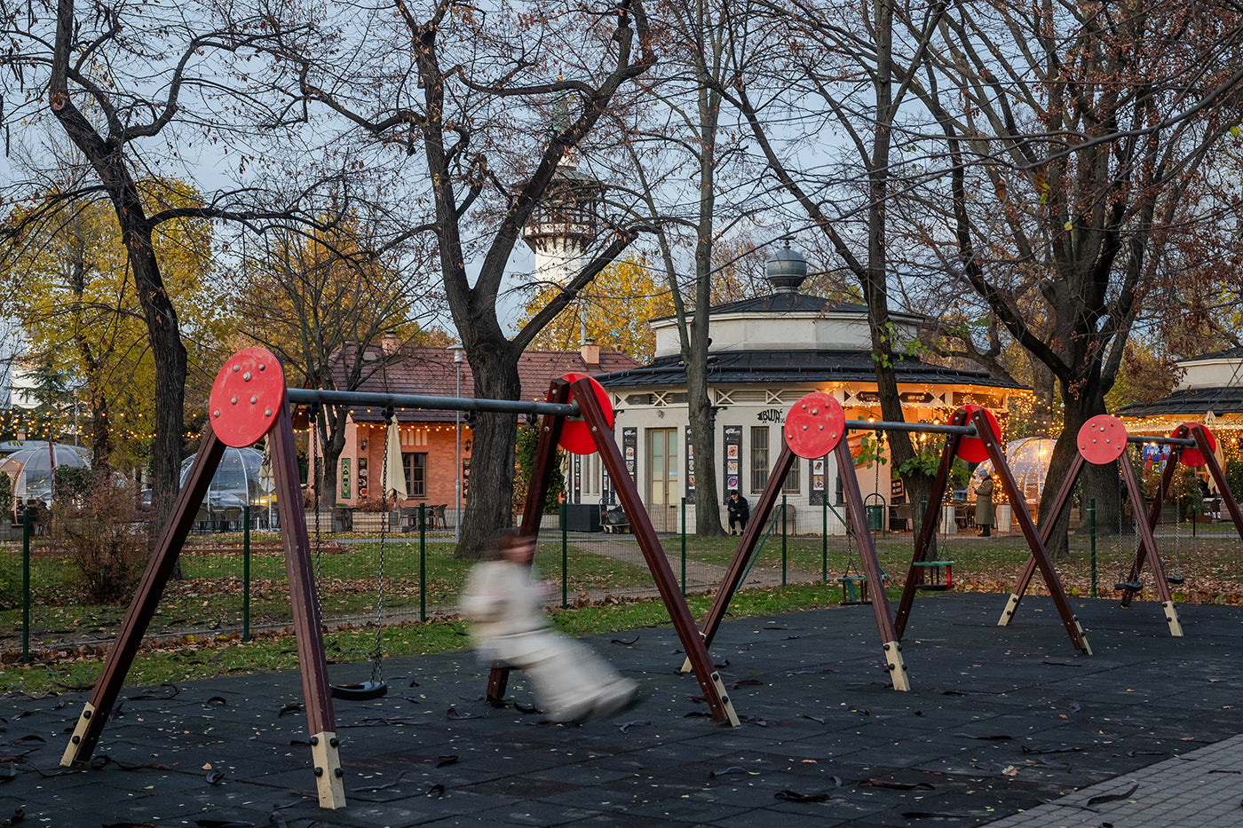Little girl on a swing in the City Park #7690