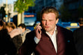 Man using mobile phone in Blaha #8737